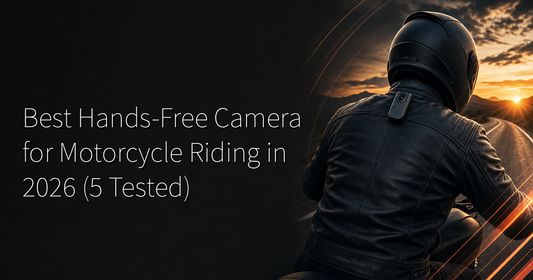Best hands-free camera for motorcycle riding — rear view of a rider on an open highway at sunset, wearable pendant camera clipped to leather jacket collar