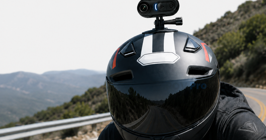 Motorcycle helmet with POV Pro camera mounted on mountain road